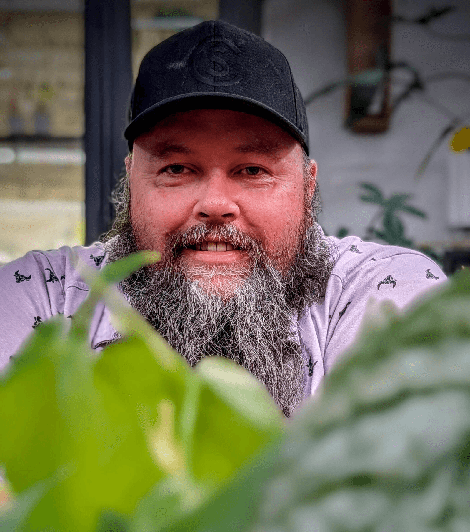 A picture of Richard with some of his plants